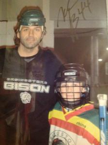 Mark Desantis poses with a young Elliott Dewey, now a member of the Bison roster. Photo courtesy of Debbie Dewey